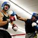 A-Square fighter LaSean Holmes hits Northend boxer Casanovis Williams during the A-Square Fight Club Boxing Showcase on Friday, July 19. Daniel Brenner I AnnArbor.com